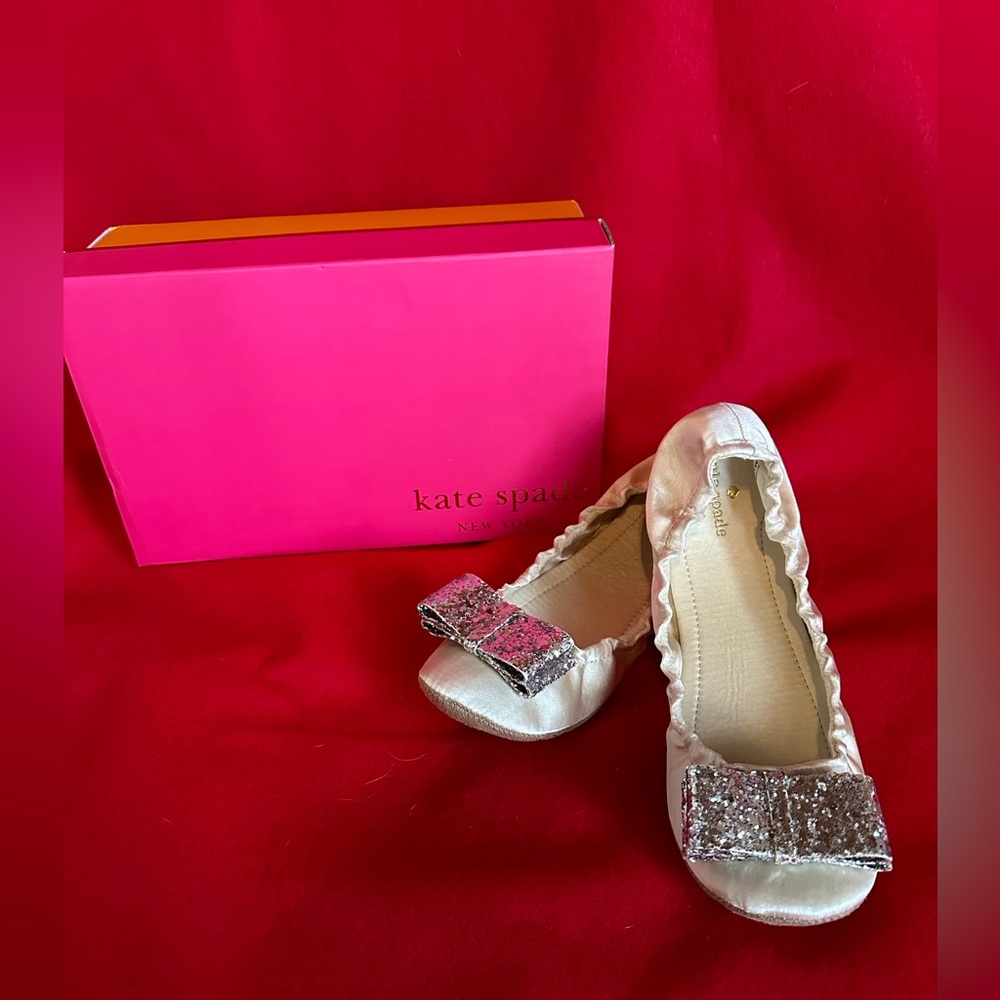 Kate Spade ivory satin ballet flat with silver glitter bows.  Size 7.